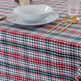 Toalha de mesa em algodão com estampado xadrez verde e vermelho.