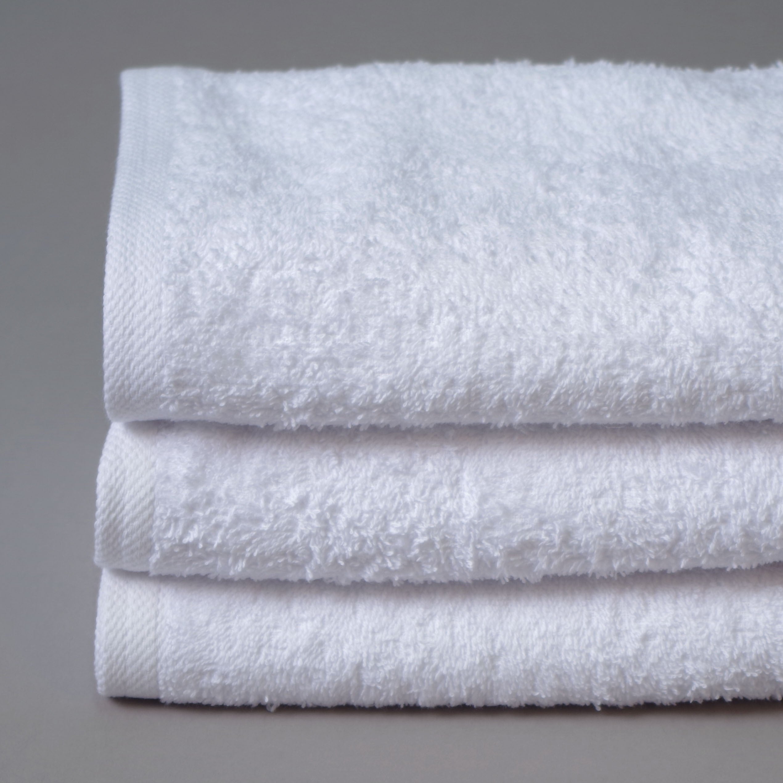 Toalla algodón cardado 50x100cm blanco - Pack 3 unidades