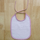 Babete atoalhado liso branco/rosa 20x25