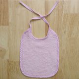 Babete atoalhado liso rosa 25x30