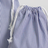 Conjunto de mochila e saco escolar em tecido, composto por 2 peças.