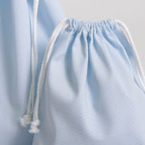 Conjunto de mochila e saco escolar em tecido, composto por 2 peças.